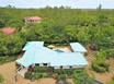 Private 1.190 acres Beautifully Landscaped Oasis in Gated Community